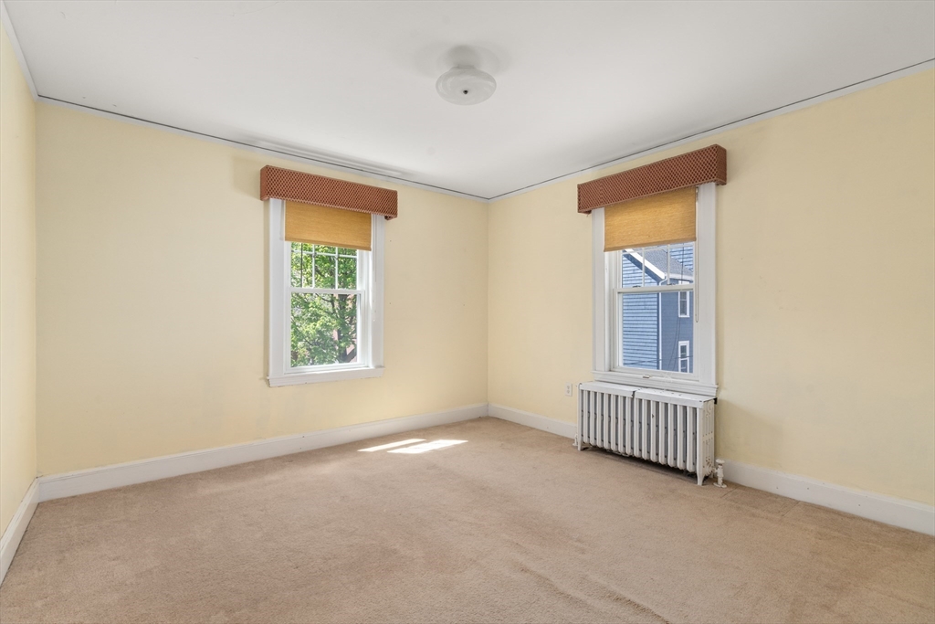 9 Searle Avenue Brookline, MA 02445 - Photo 18 of 35 an empty room with windows