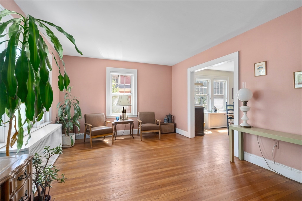 9 Searle Avenue Brookline, MA 02445 - Photo 2 of 35 a living room with furniture and a wooden floor