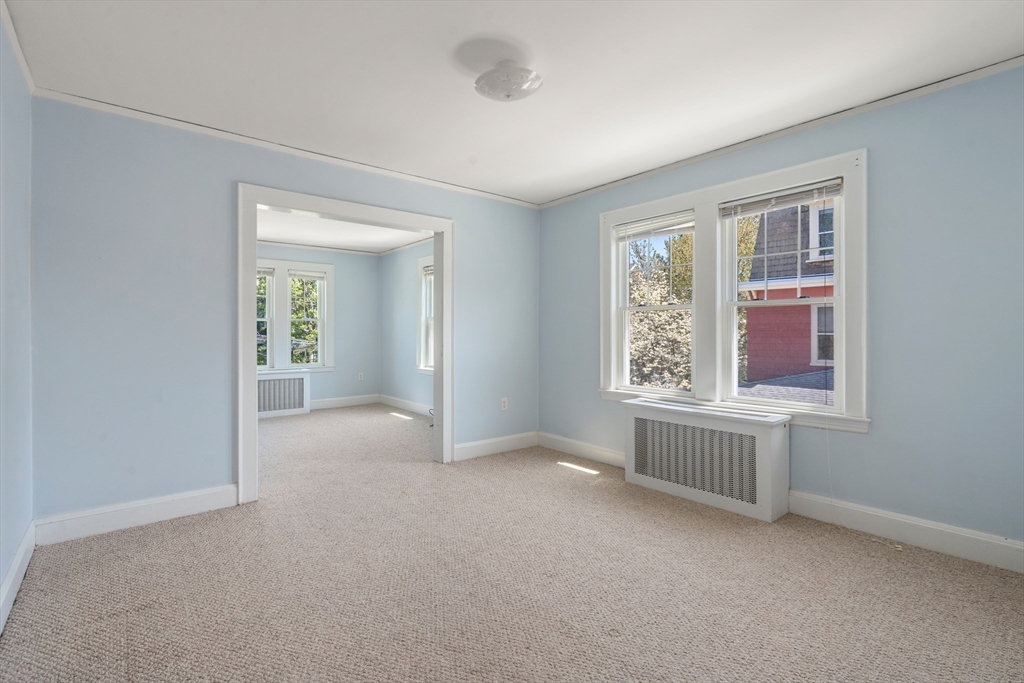 9 Searle Avenue Brookline, MA 02445 - Photo 23 of 35 an empty room with windows
