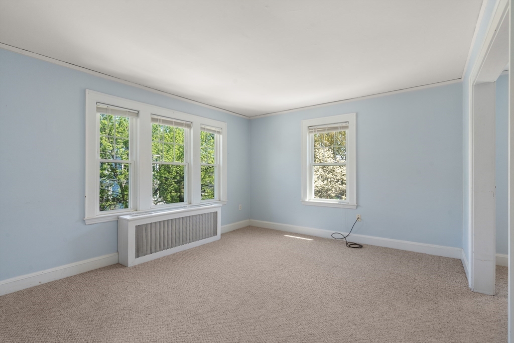 9 Searle Avenue Brookline, MA 02445 - Photo 25 of 35 an empty room with a window