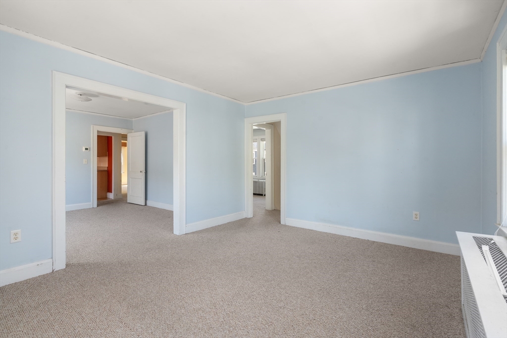 9 Searle Avenue Brookline, MA 02445 - Photo 27 of 35 a view of an empty room and closet area