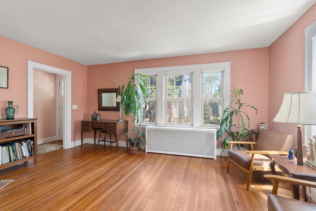 9 Searle Avenue Brookline, MA 02445 - Photo 3 of 35 a living room with furniture and a wooden floor