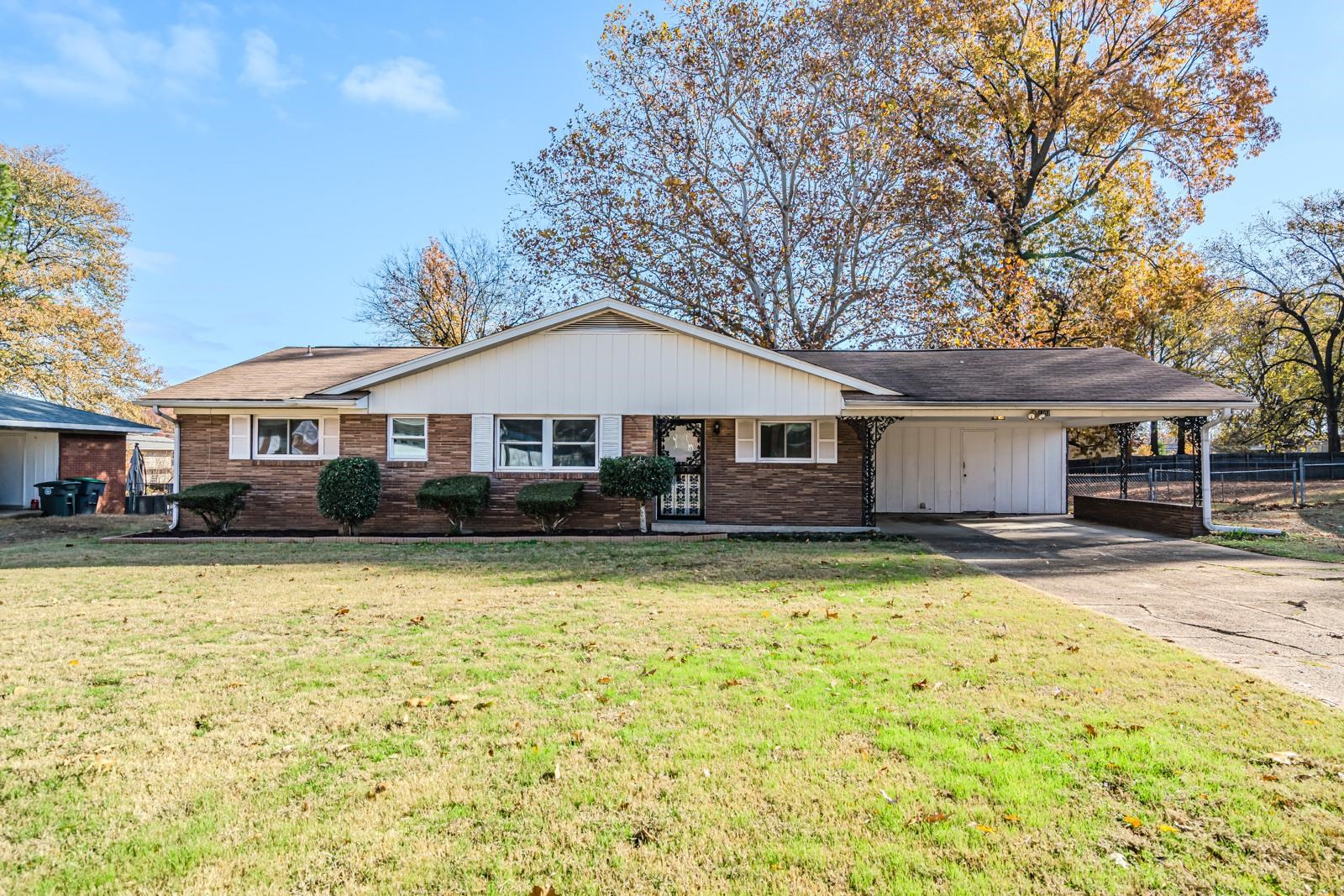 4202 Ambrose Road Memphis, TN 38116 - Photo 1 of 28 a front view of a house with swimming pool