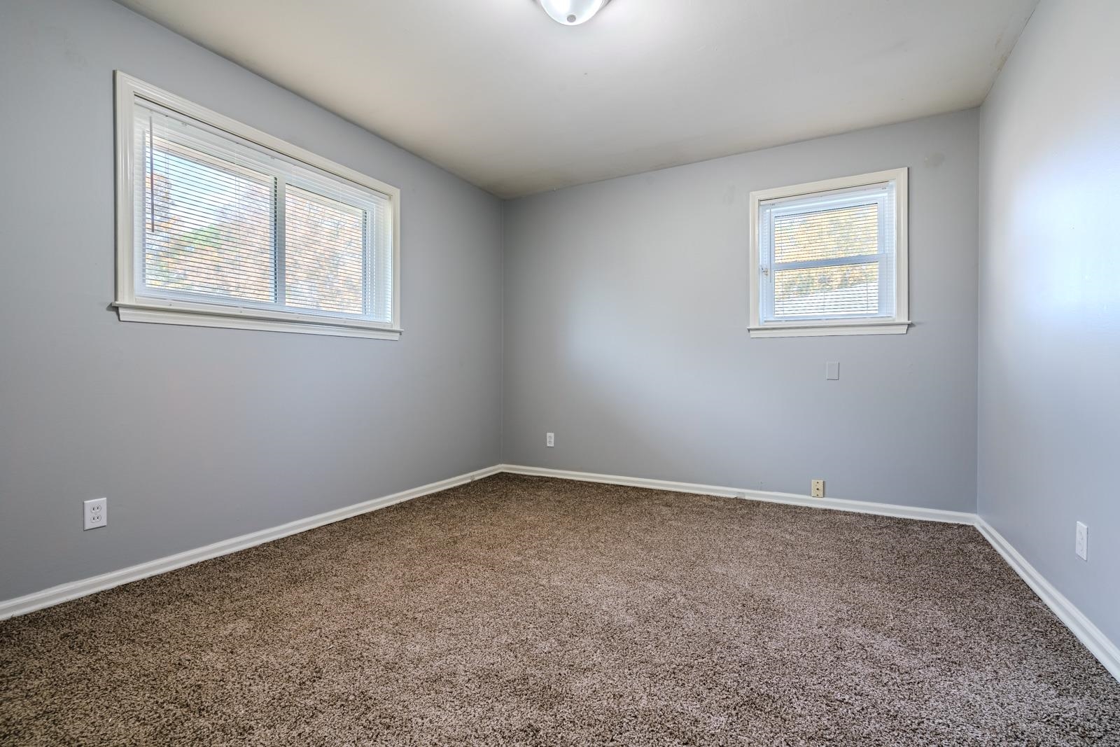 4202 Ambrose Road Memphis, TN 38116 - Photo 18 of 28 a view of an empty room with a window
