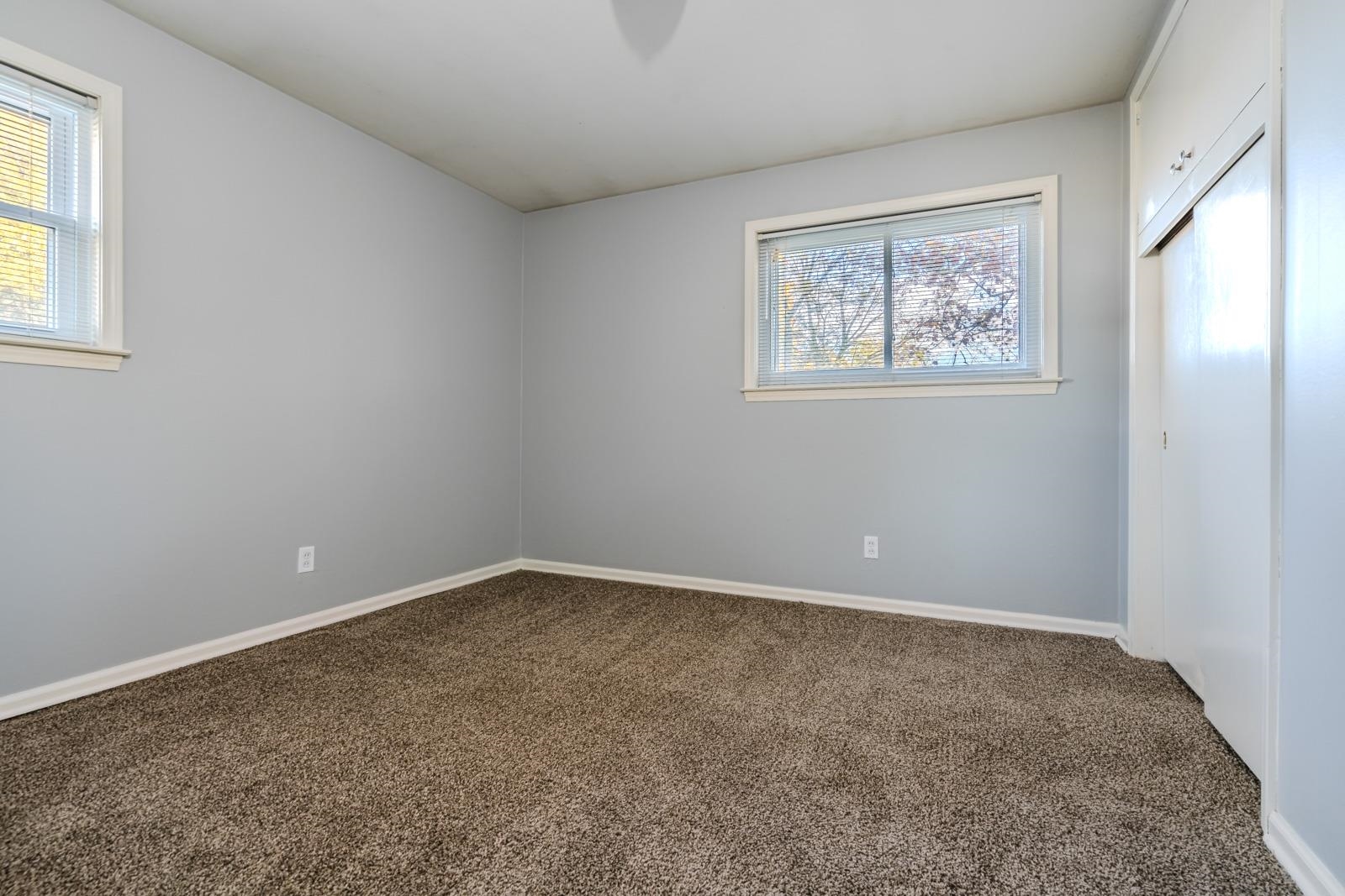 4202 Ambrose Road Memphis, TN 38116 - Photo 21 of 28 an empty room with windows
