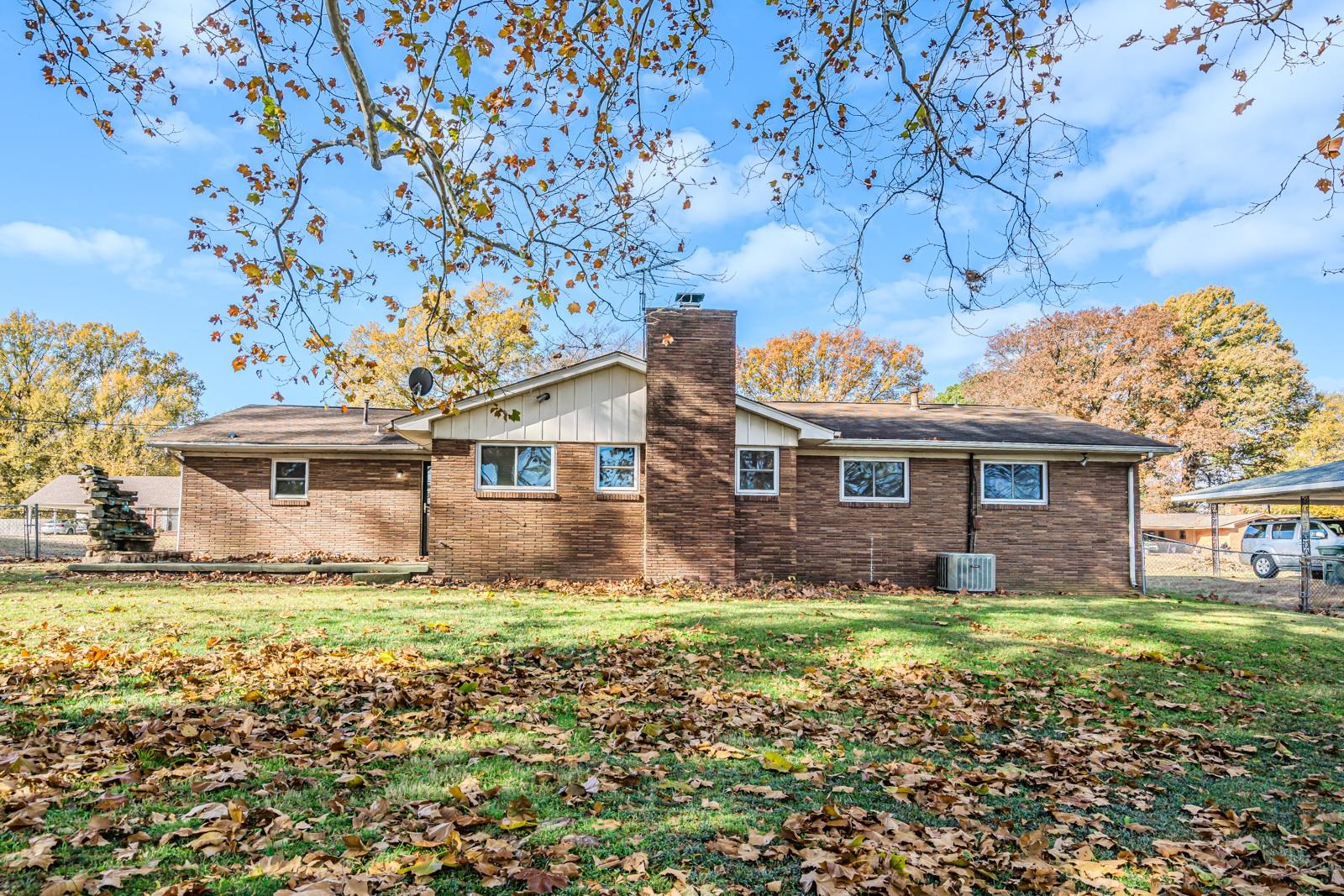 4202 Ambrose Road Memphis, TN 38116 - Photo 25 of 28 a front view of a house with a garden