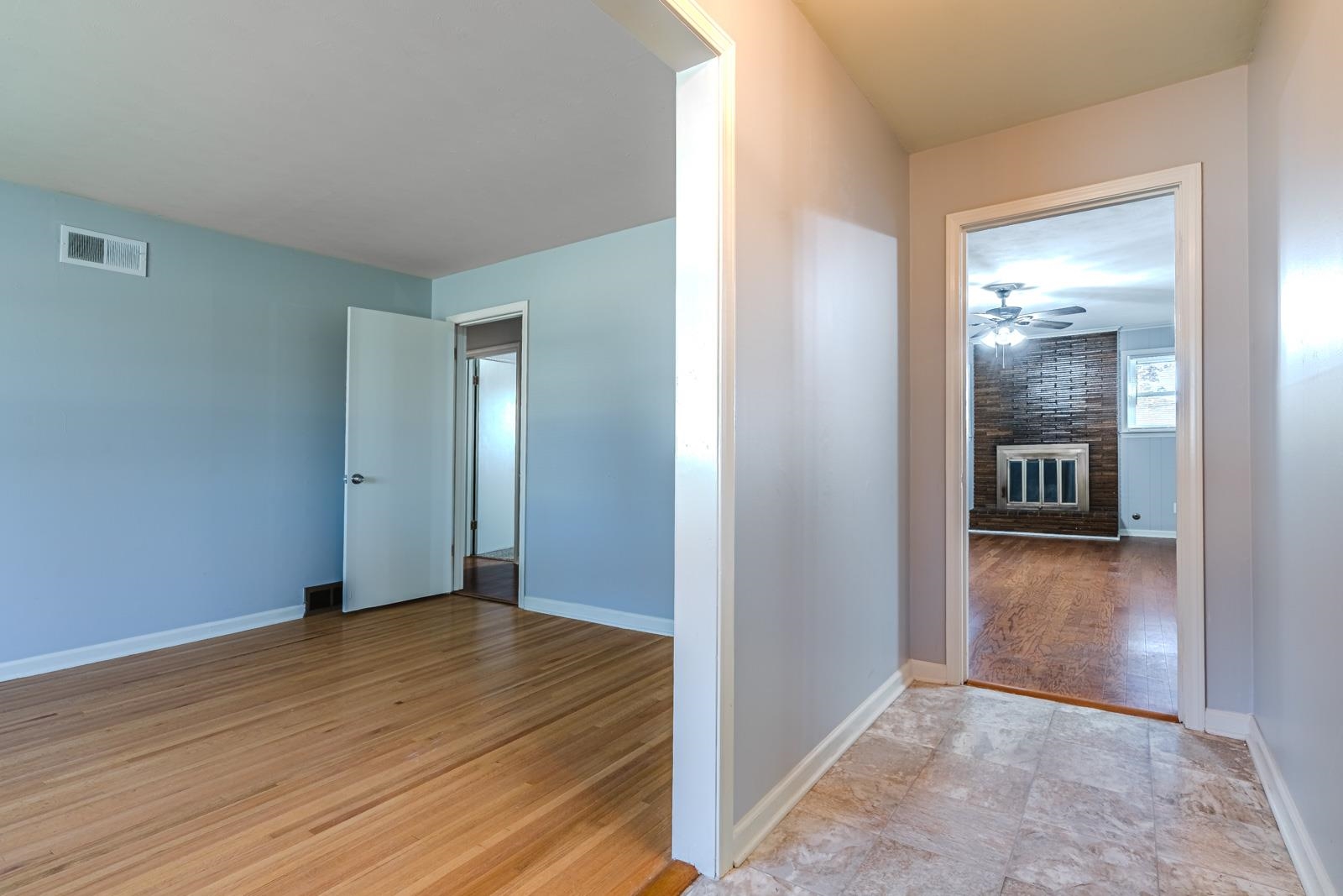 4202 Ambrose Road Memphis, TN 38116 - Photo 7 of 28 a view of an empty room with wooden floor