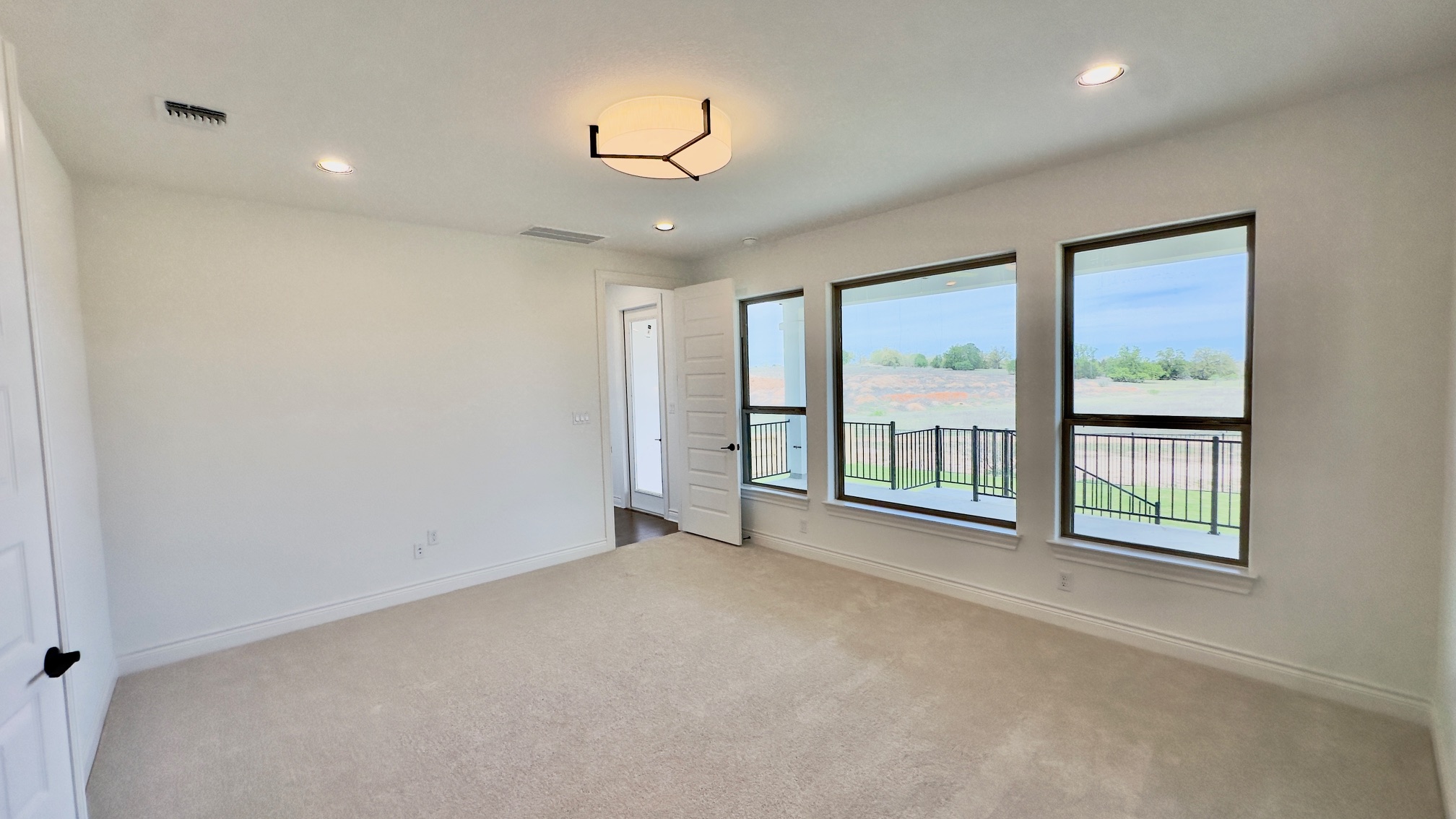 150 Firethorn Loop Bastrop, TX 78602 - Photo 22 of 39 a view of an empty room with a window