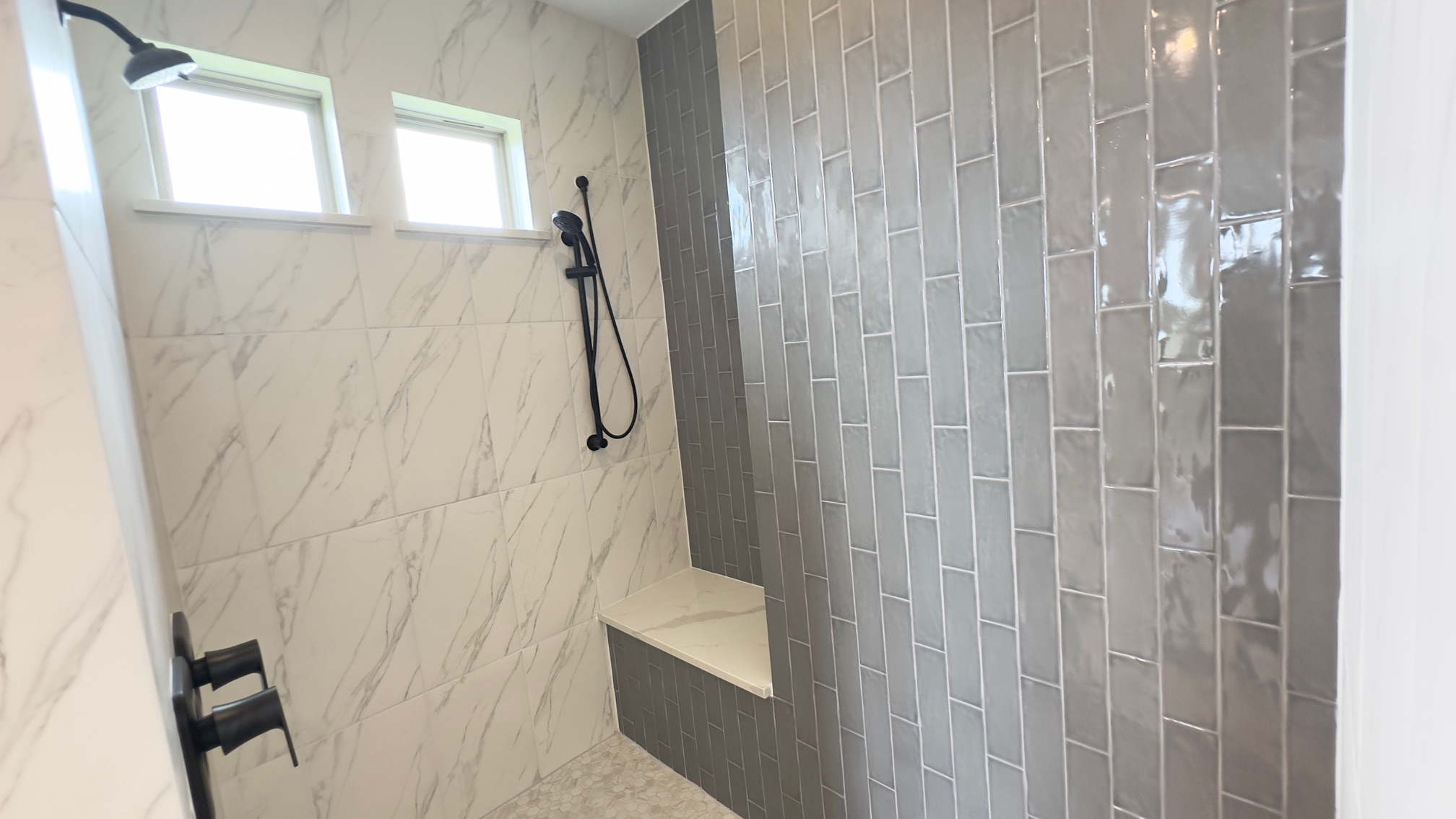 150 Firethorn Loop Bastrop, TX 78602 - Photo 25 of 39 a bathroom with a shower and a tub