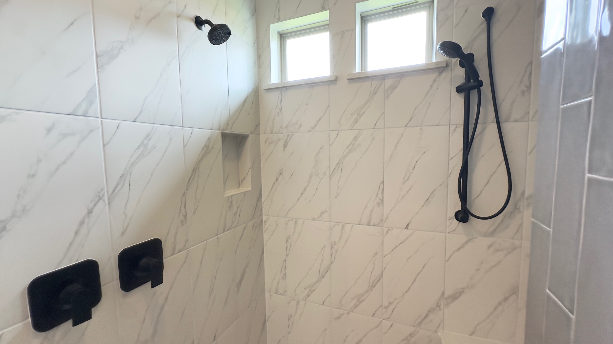150 Firethorn Loop Bastrop, TX 78602 - Photo 26 of 39 a bathroom with a shower