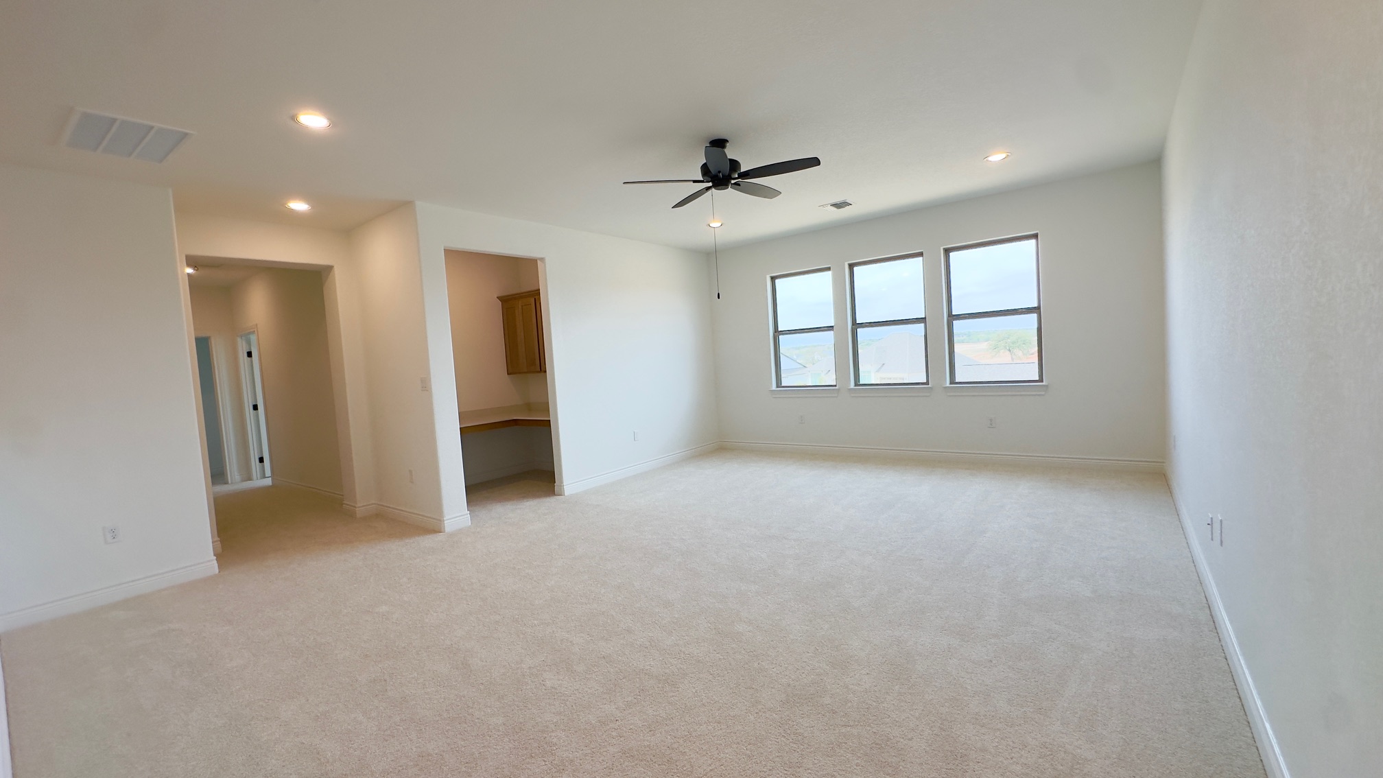 150 Firethorn Loop Bastrop, TX 78602 - Photo 35 of 39 a view of an empty room with a window