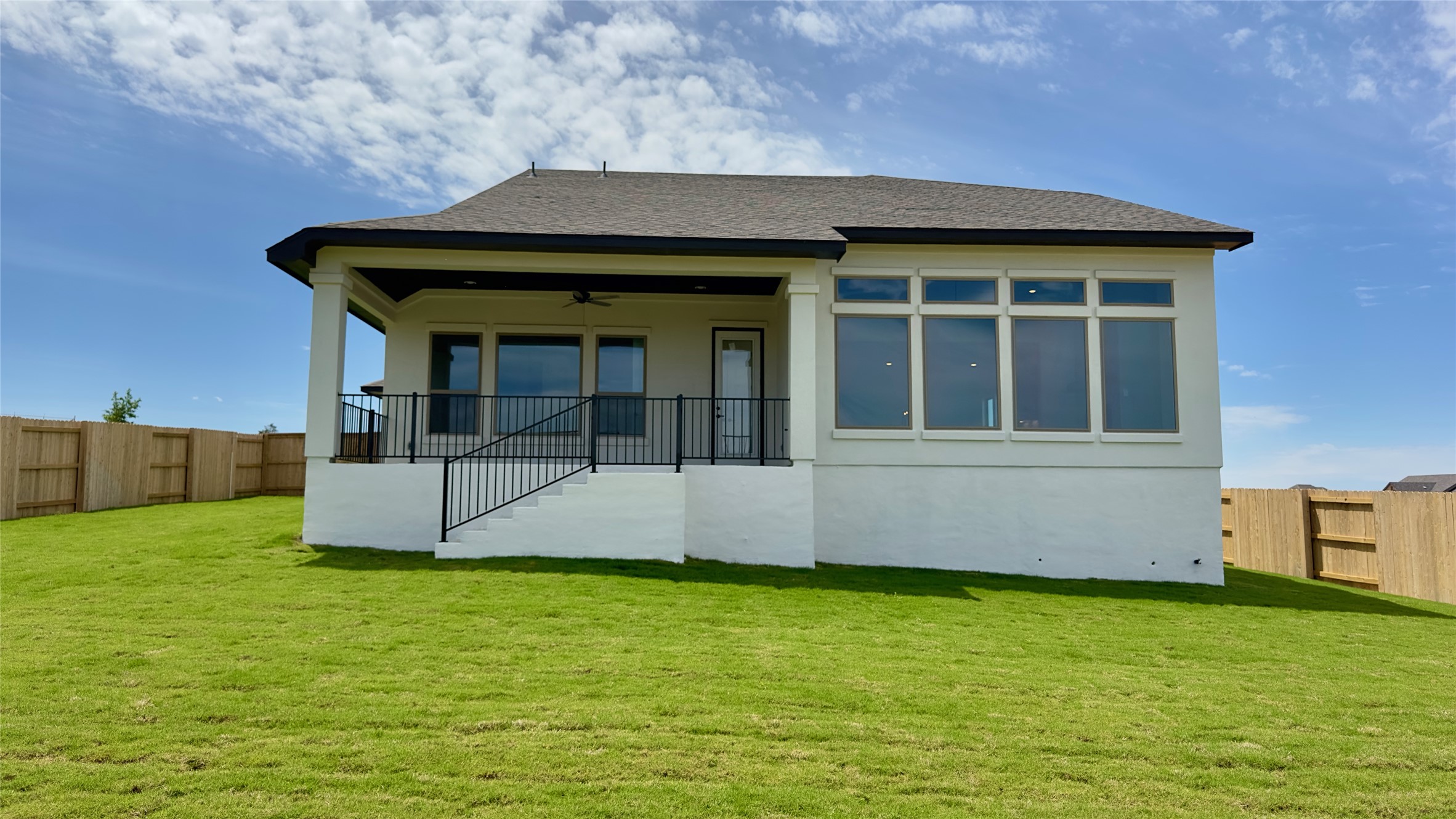 150 Firethorn Loop Bastrop, TX 78602 - Photo 39 of 39 a front view of a house with a yard