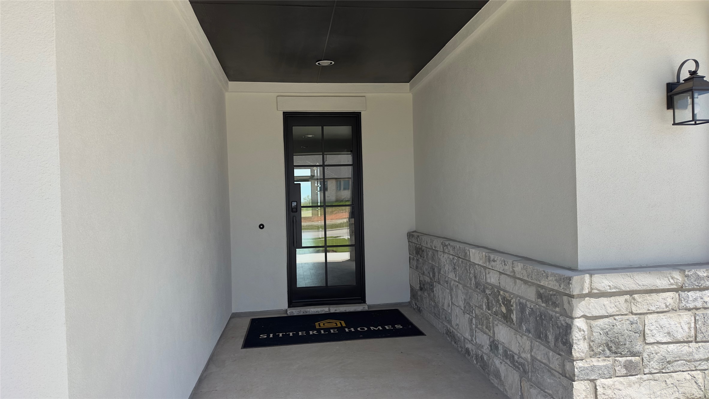 150 Firethorn Loop Bastrop, TX 78602 - Photo 5 of 39 a room with window and a rug