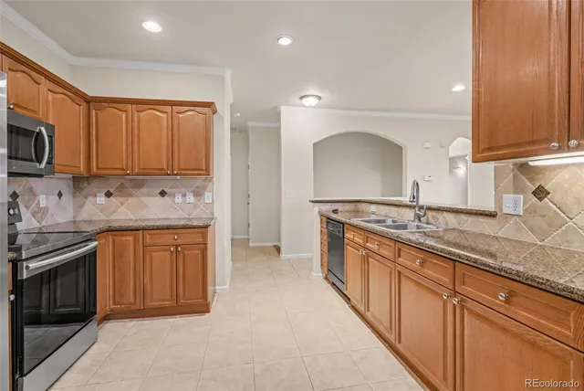 a spacious bathroom with a toilet sink