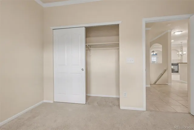 a bathroom with a granite countertop sink a toilet and bathtub