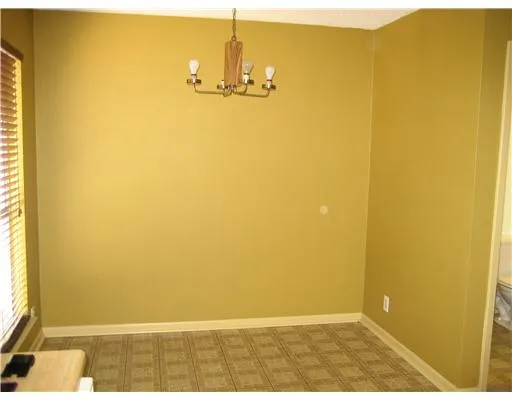 a view of a room with a door