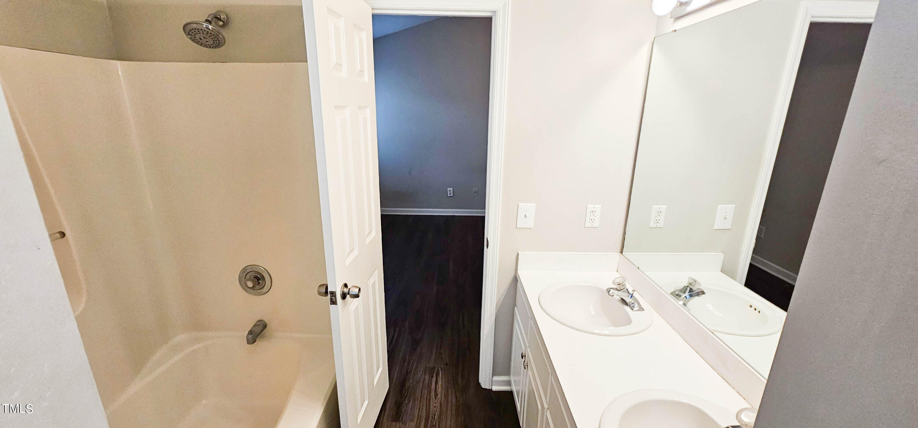 2141 Leadenhall Way Raleigh, NC 27603 - Photo 14 of 24 a bathroom with a sink a toilet and shower