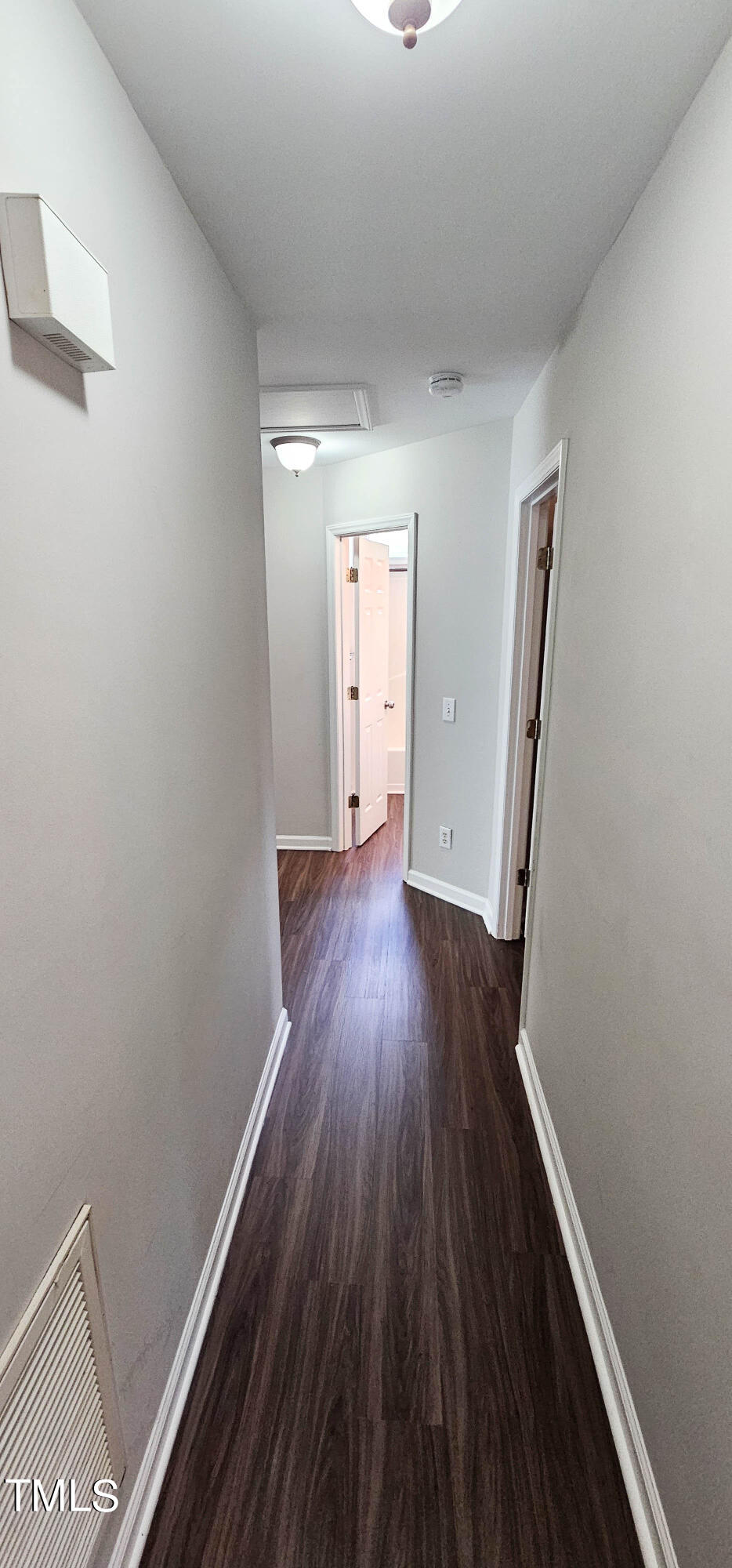 2141 Leadenhall Way Raleigh, NC 27603 - Photo 10 of 24 a view of a room with wooden floor and a window