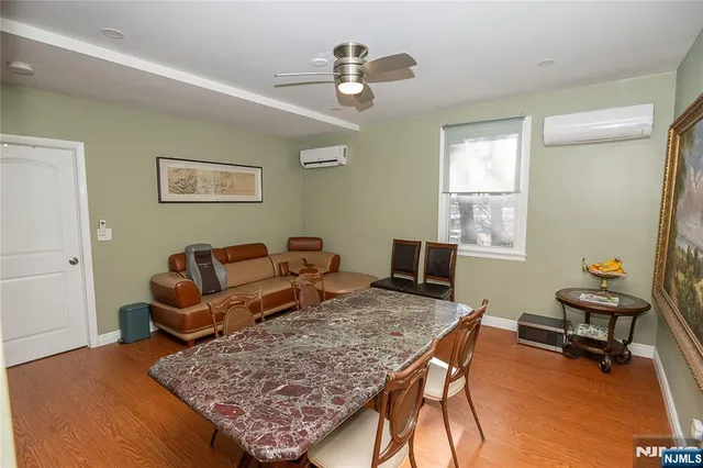 a living room with couch and a window