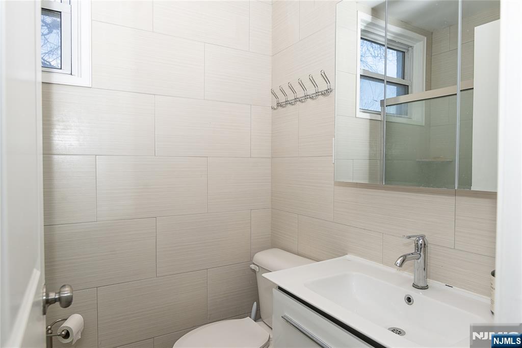 37 Riverside Avenue Little Ferry, NJ 07643 - Photo 14 of 29 a bathroom with a sink toilet and shower