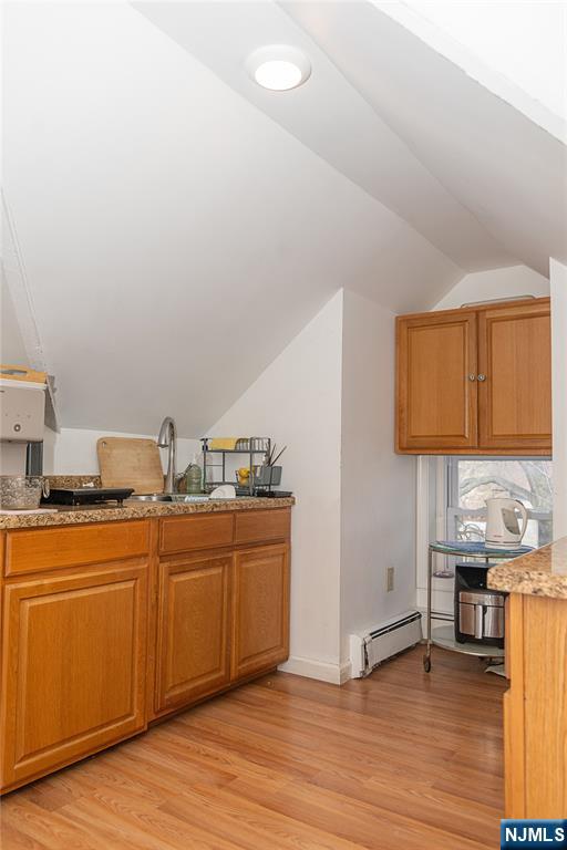 37 Riverside Avenue Little Ferry, NJ 07643 - Photo 18 of 29 a kitchen with stainless steel appliances granite countertop a sink and cabinets