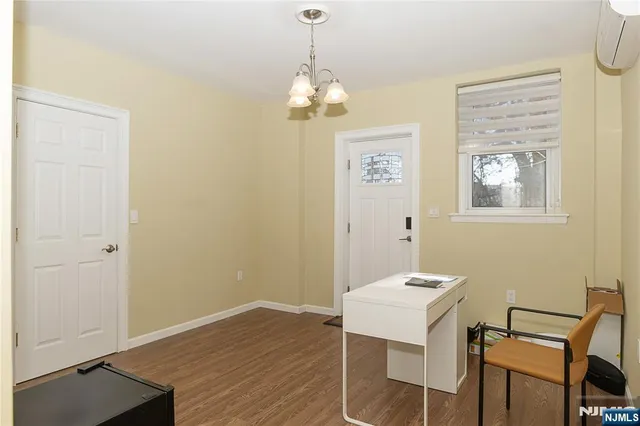 a kitchen with a wooden floor