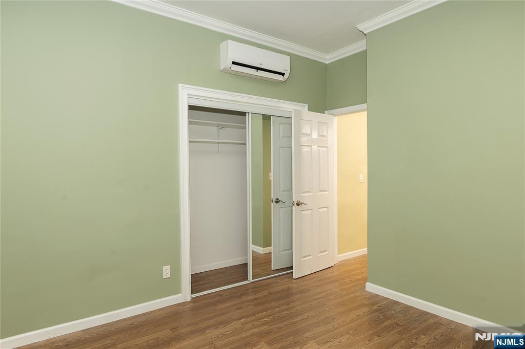 37 Riverside Avenue Little Ferry, NJ 07643 - Photo 4 of 29 a view of an empty room with wooden floor