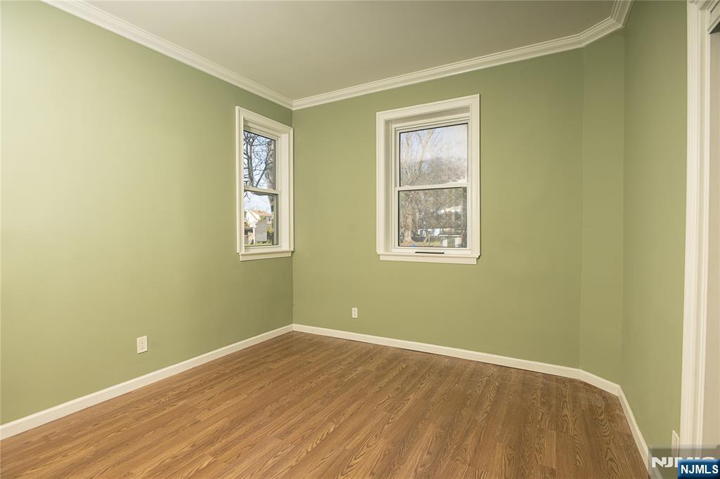 37 Riverside Avenue Little Ferry, NJ 07643 - Photo 5 of 29 a view of a big room with wooden floor and windows