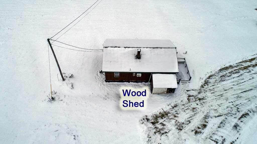608 Number 9 Road Orient, ME 04471 - Photo 75 of 80 wood-shed-log-home