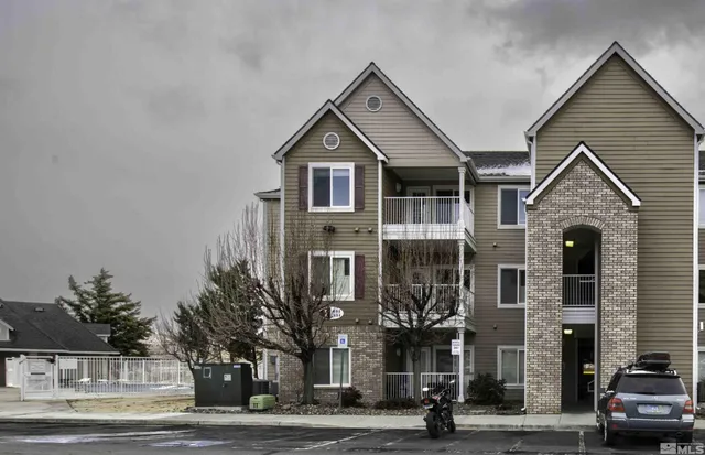 a view of a street in front of a building