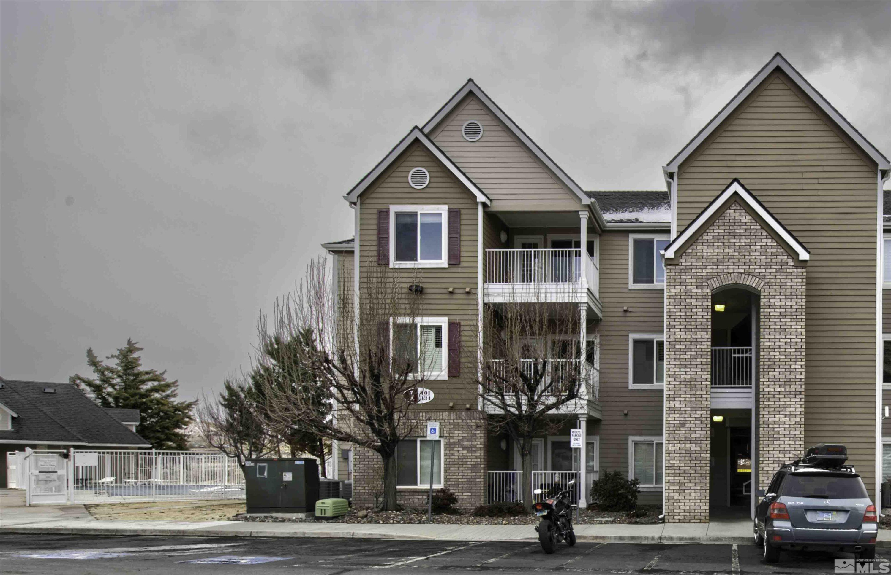 a view of a street in front of a building