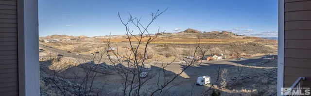 a view of a house with swimming pool