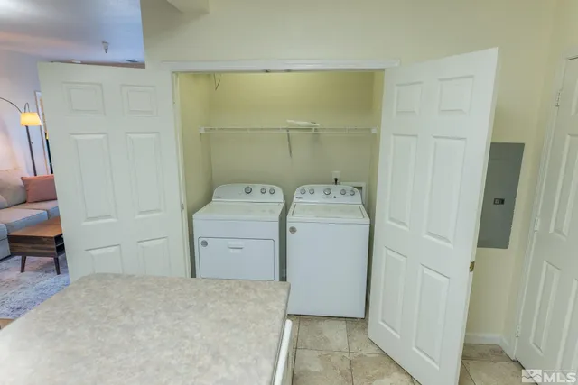 a utility room with dryer and washer