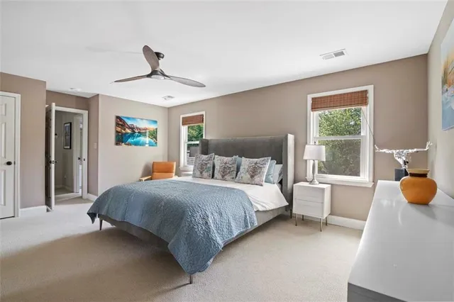 a bedroom with a bed furniture and window