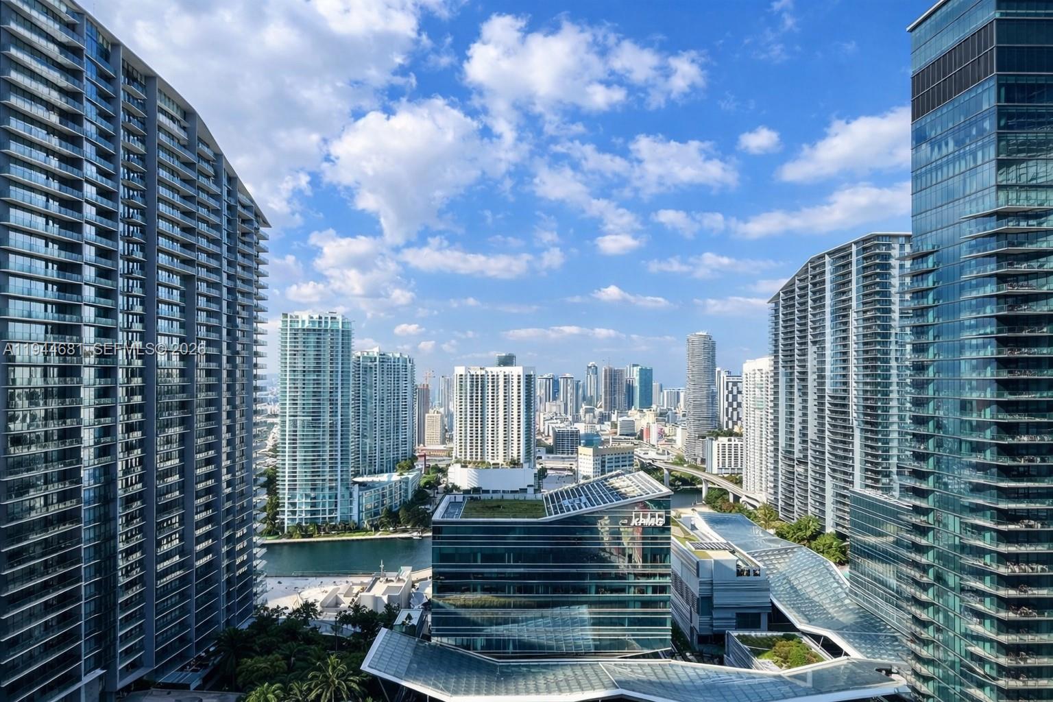 45 Southwest 9th Street, Unit 3008 Miami, FL 33130 - Photo 14 of 16 a view of a city with tall buildings