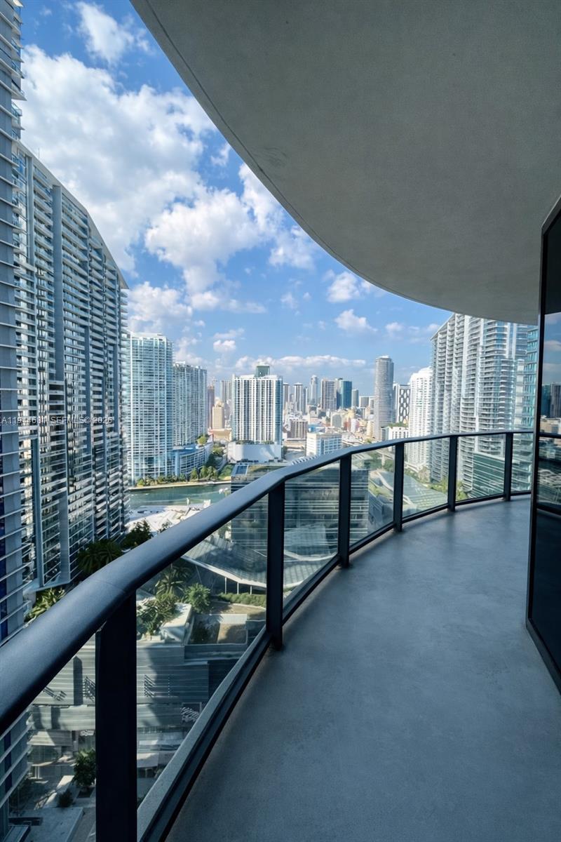 45 Southwest 9th Street, Unit 3008 Miami, FL 33130 - Photo 15 of 16 a view of railway station with lots of trees in the background