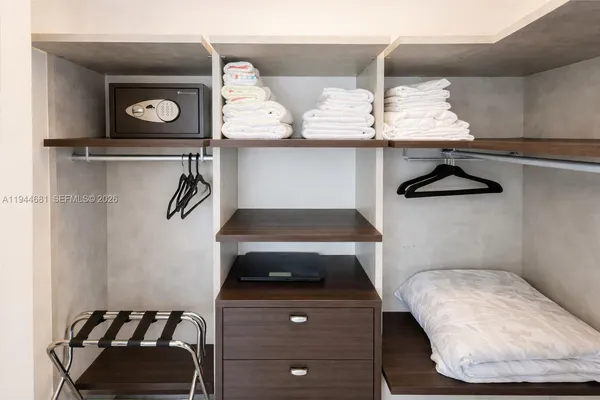 a kitchen with a cabinets and window