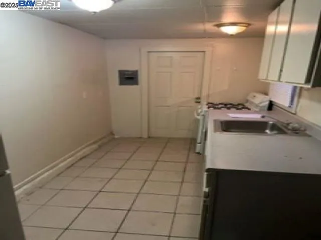 a view of a kitchen with a sink