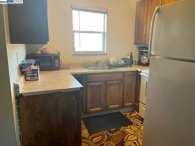 a room with a sink and a window