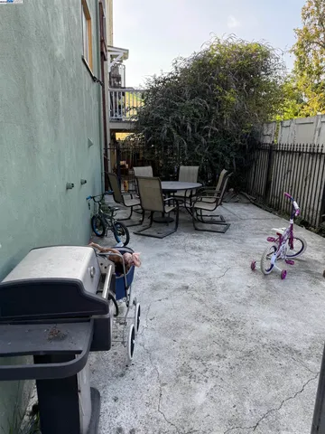 a view of backyard with trampoline