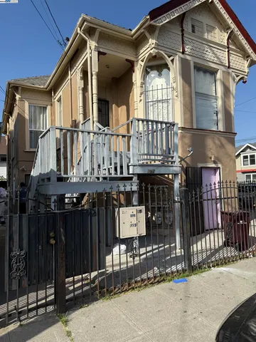 a front view of a house with a glass windows
