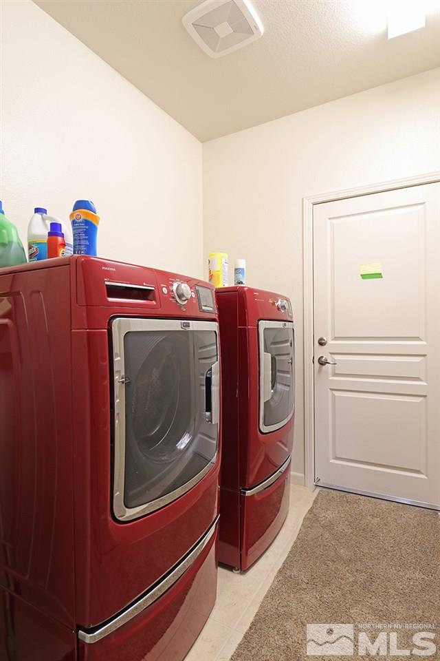 1142 Callaway Trail Reno, NV 89523 - Photo 16 of 21 a utility room with dryer and washer