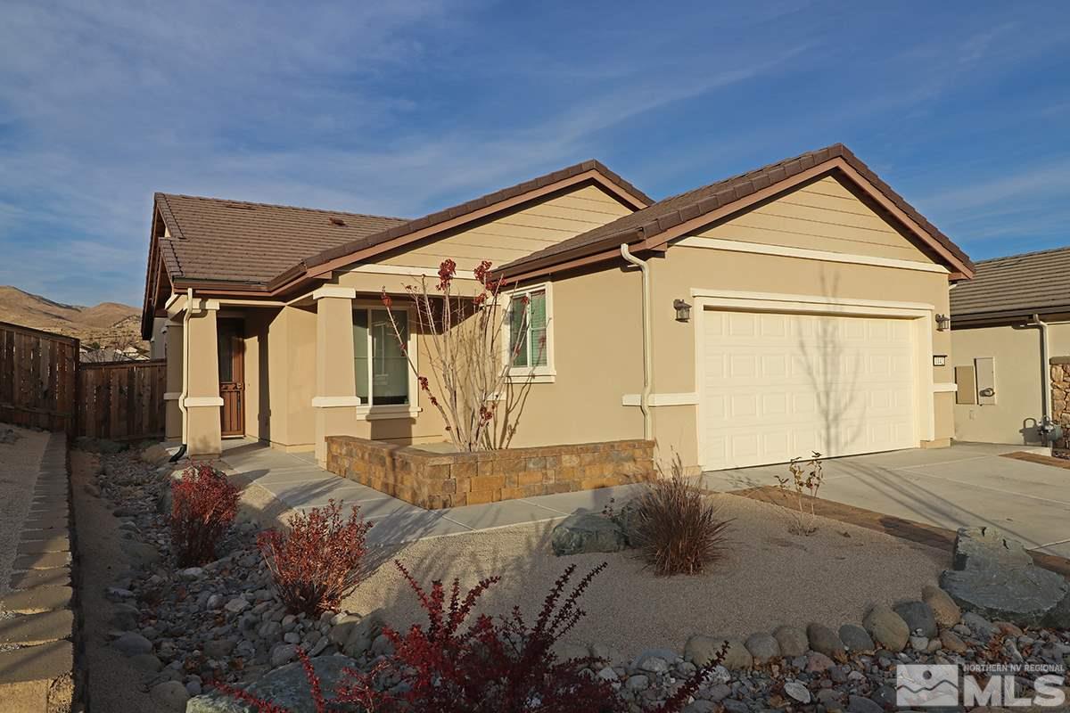 1142 Callaway Trail Reno, NV 89523 - Photo 2 of 21 a front view of a house with garden