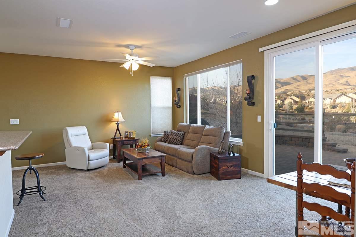 1142 Callaway Trail Reno, NV 89523 - Photo 4 of 21 a living room with furniture and a large window
