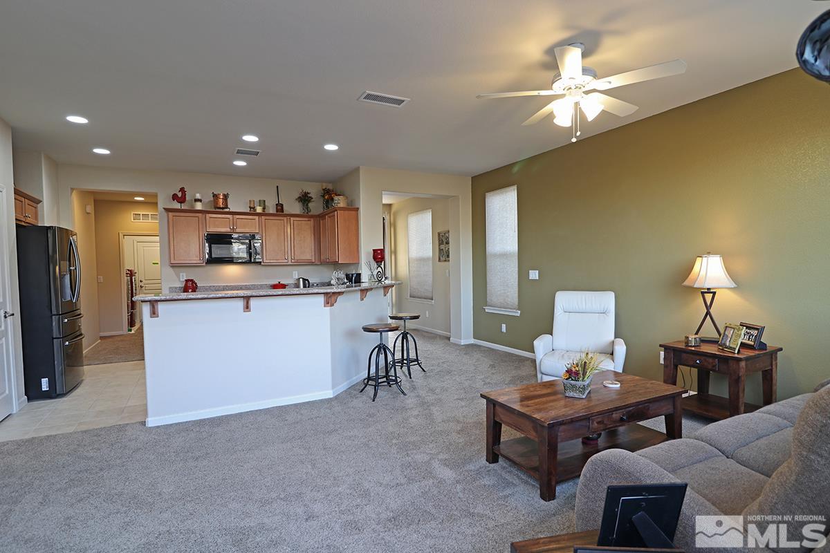 1142 Callaway Trail Reno, NV 89523 - Photo 5 of 21 a living room with furniture and kitchen view