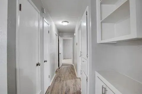 a view of a hallway with entryway