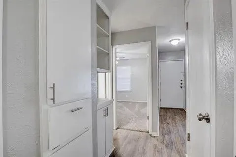a bathroom with a glass shower door