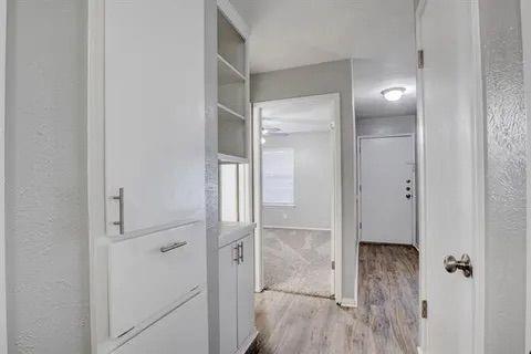 8230 El Retiro Road Fort Worth, TX 76116 - Photo 14 of 21 a bathroom with a glass shower door