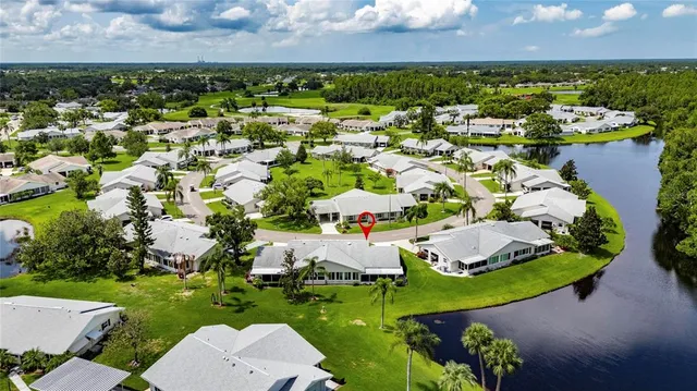 an aerial view of a house with a garden