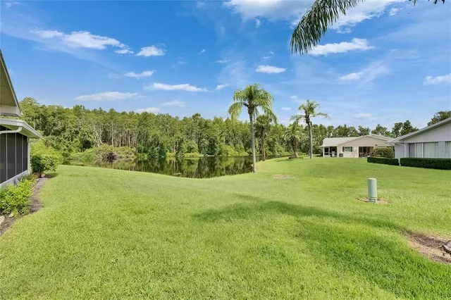 a backyard of a house with lots of green space